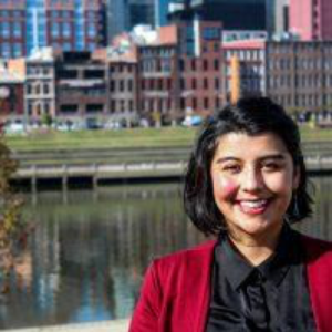 girl with Nashville skyline behind her